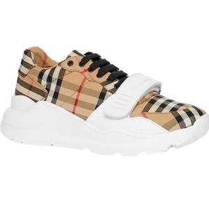 Burberry Sneakers! Super cute with a chunky heal. Little marks on shoes.